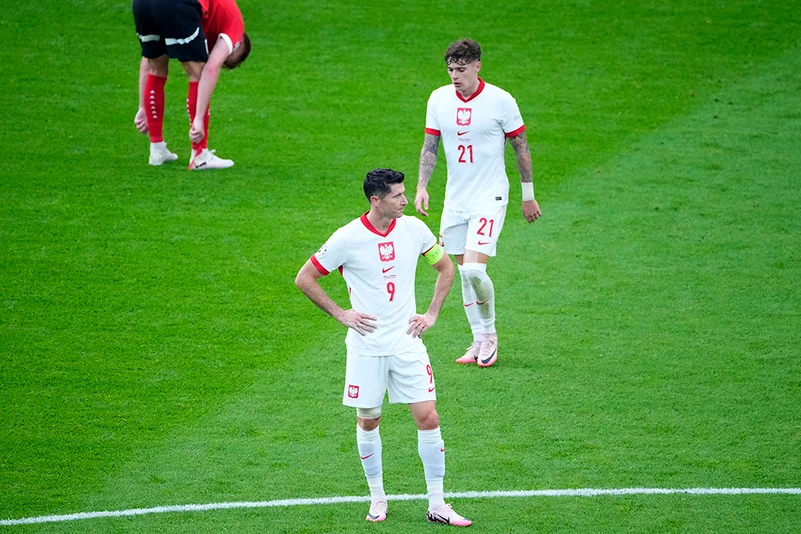 Polands Robert Lewandowski reacts at the end of match